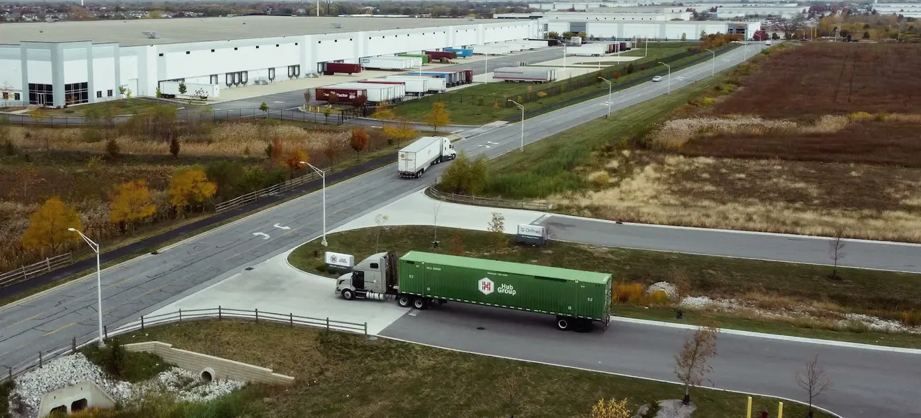 A truck leaving a distribution center, seen from the air