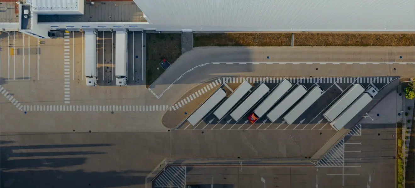 Trailers at a distribution center's dock, seen from above